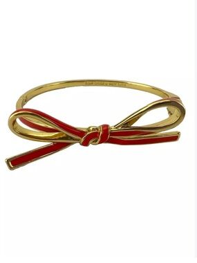 Kate Spade New York Pink and Gold Enamel Bow bangle bracelet